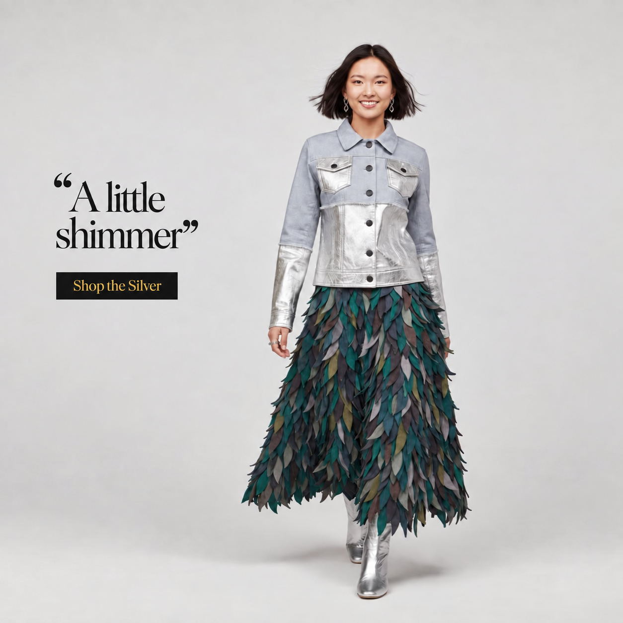 Model wearing the Bell Ivory silver metallic jacket with a “A little shimmer” headline and a Shop the Silver button